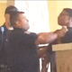 Video footage shows a police school resource officer grabbing 14-year-old Gyasi Hughes by the throat before throwing him to the floor at Round Rock High School in Round Rock, Texas, on Oct. 8, 2015.
KXAN screenshot